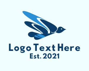 Flying - Blue Flying Dove logo design