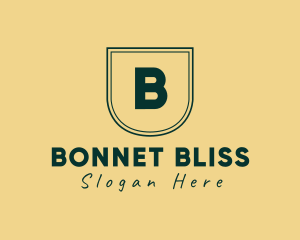 Elegant Shield Fashion Apparel logo design