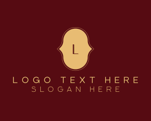 Restaurant - Gold Cursive Lettermark logo design