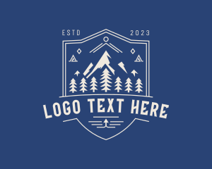 Wilderness - Adventure Travel Mountain logo design