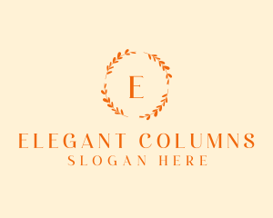 Elegant Gold Floral Wreath logo design