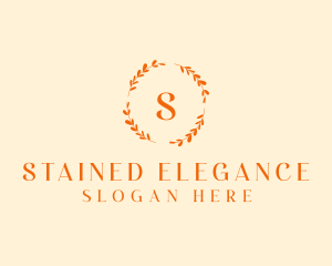 Elegant Gold Floral Wreath logo design