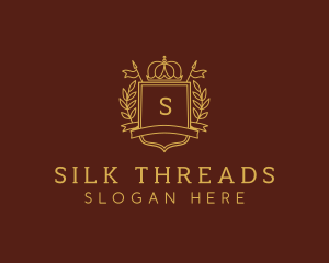 Elegant Crown Shield logo design