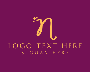 Nail Polish - Gold Sparkle Letter N logo design