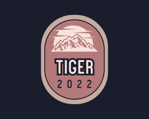 Traveler - Mountain Sunset Adventure logo design