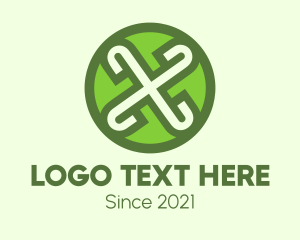 Green Cross - Green Celtic Shield Letter X logo design