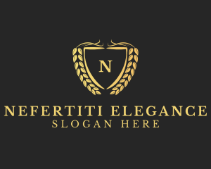 Elegant Shield Wreath Lettermark logo design