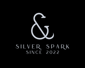 Silver Ampersand Lettering logo design