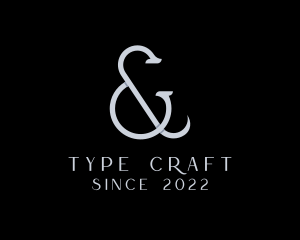 Silver Ampersand Lettering logo design