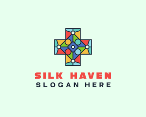 Colorful Stained Glass Cross logo design