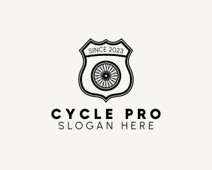 Rustic Bicycle Wheel Shield logo design