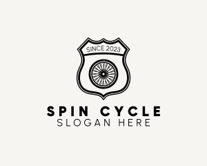 Rustic Bicycle Wheel Shield logo design