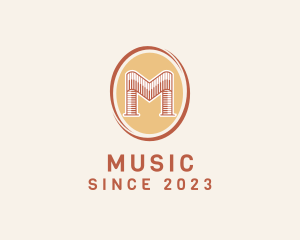 Music Piano Letter M  logo design
