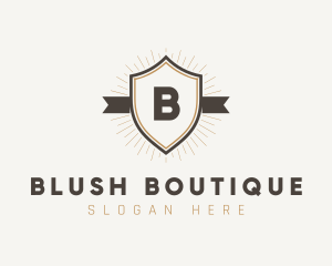 Ribbon Shield Boutique logo design