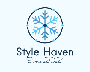 Skiing - Blue Winter Snowflake logo design