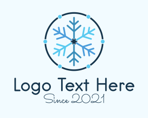 Skiing - Blue Winter Snowflake logo design