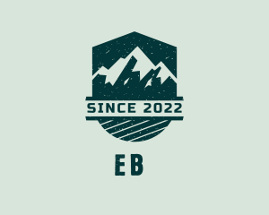 Grunge - Outdoor Mountaineering Shield logo design