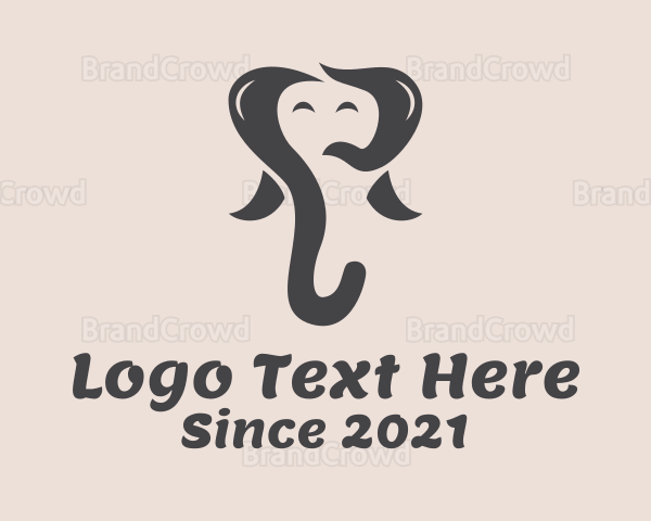 Happy Elephant Cartoon Logo