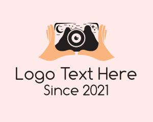Camera - Nature Photographer Hand logo design