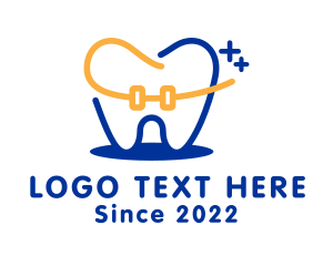Toothbrush - Kids Dental Braces logo design