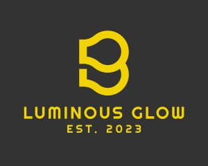 Illuminated - Gold Light Bulb Letter B logo design