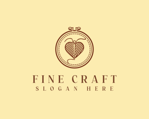 Embroidery Needle Heart logo design