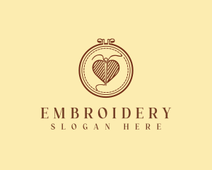 Embroidery Needle Heart logo design