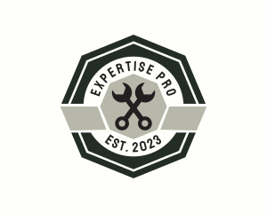 Wrench Mechanic Badge logo design