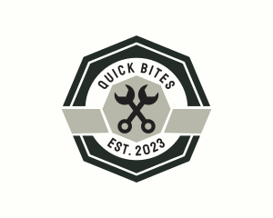 Wrench Mechanic Badge logo design