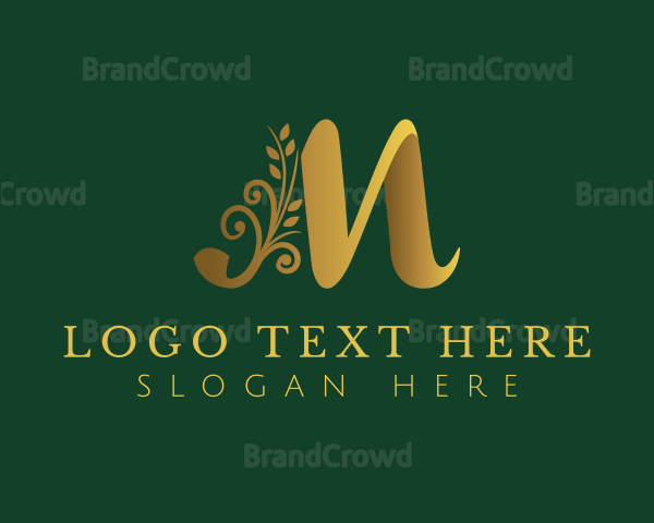 Golden Floral Letter M Logo