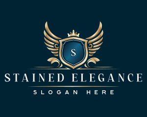 Elegant Crown Crest Wing logo design