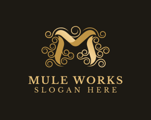 Elegant Gold Letter M logo design