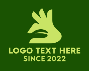 Negative Space - Green Hand Garden logo design