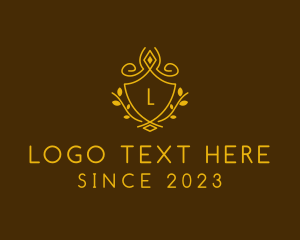 Letter - Ornamental Vine Shield logo design