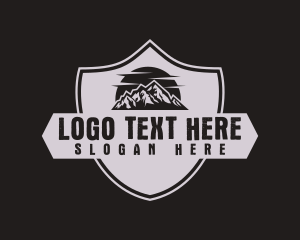 Explore - Mountain Sun Shield logo design