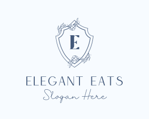 Elegant Floral Shield logo design