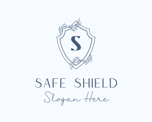 Elegant Floral Shield logo design