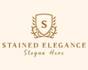 Elegant Deluxe Boutique Shield logo design