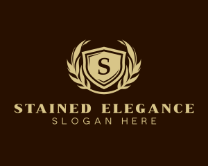 Elegant Shield Wreath logo design