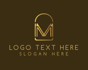 Boutique - Gold Luxury Arch Letter M logo design