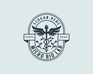 Organic Pharmacy Caduceus logo design