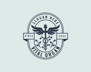 Organic Pharmacy Caduceus logo design