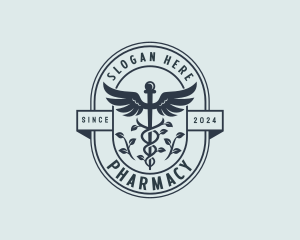 Organic Pharmacy Caduceus logo design