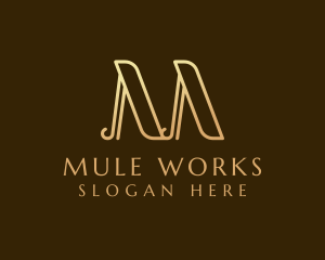 Elegant Gold Letter M logo design