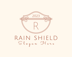 Classic Ornate Shield Boutique logo design