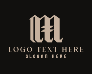 Tattoo Studio Letter M Logo