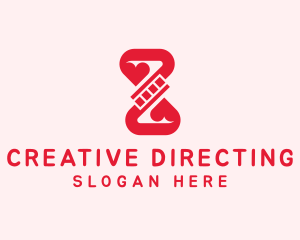 Directing - Red Romantic Filmstrip logo design