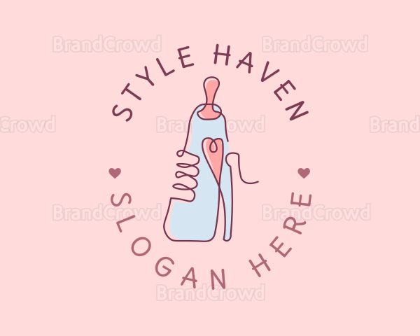 Baby Bottle Heart Logo