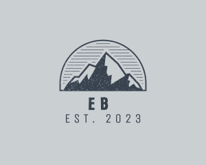 Explorer - Rustic Mountain Summit logo design