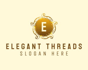 Elegant Gold Wreath logo design